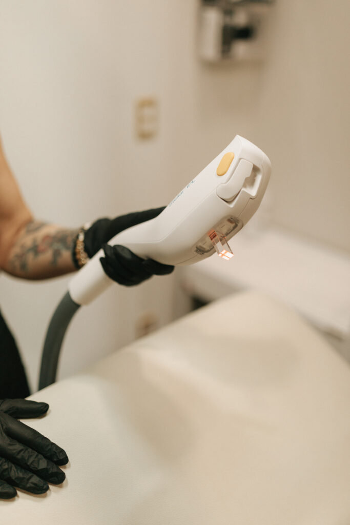 Advanced IPL handpiece used for skin rejuvenation treatment in a professional med spa setting